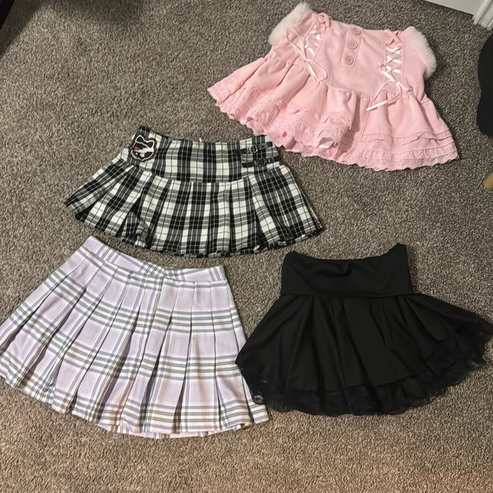 The purple skirt is forever 21, the black plaid is an Abby Dawn, to other IDK